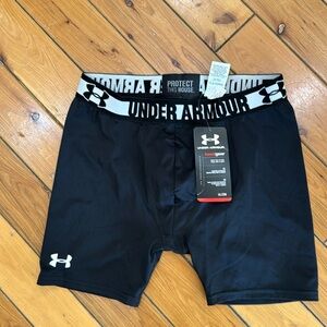 Under Armour fitted boys shorts. Never worn